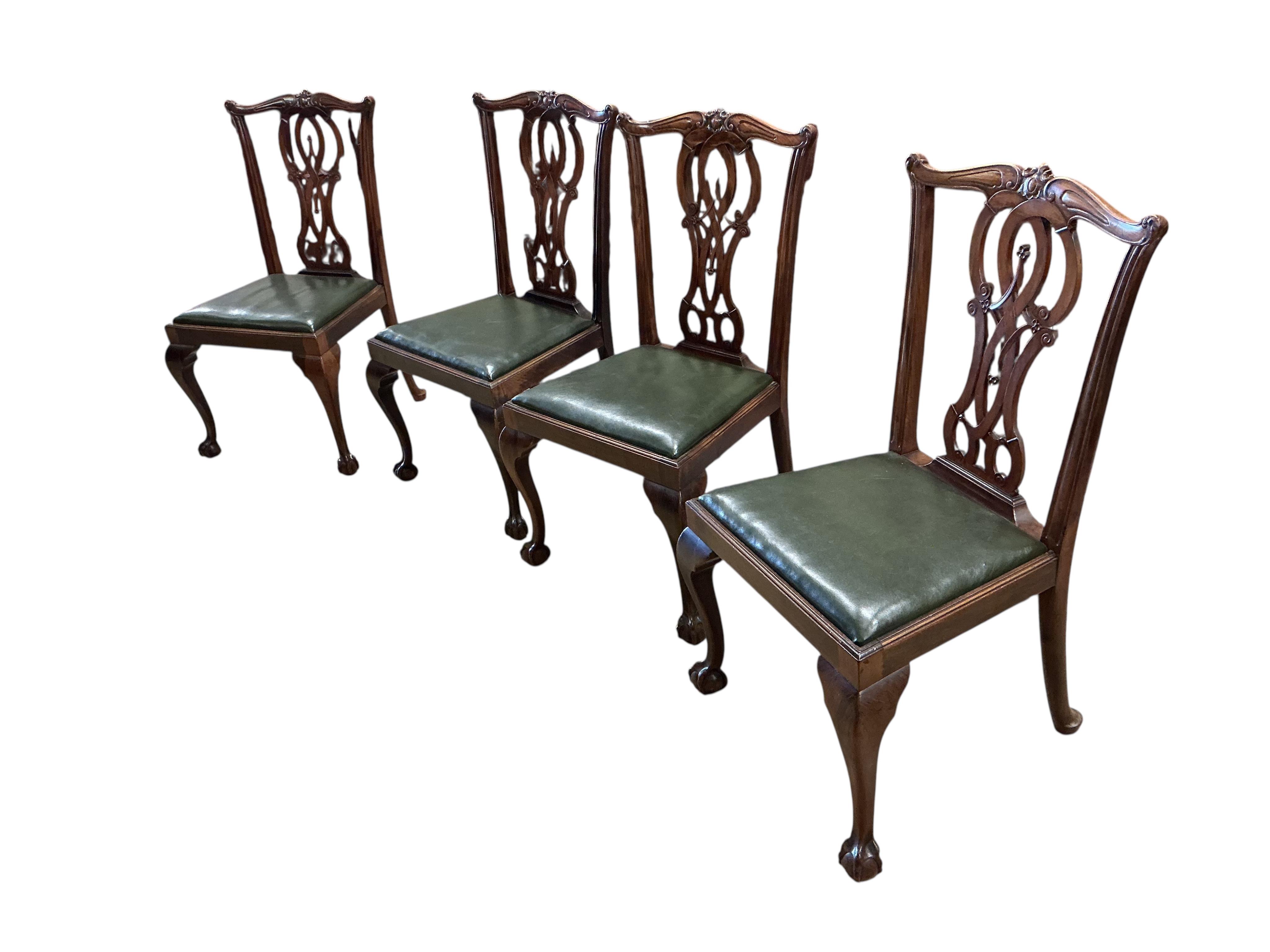 A set of nine Chippendale Revival mahogany dining chairs, two with arms